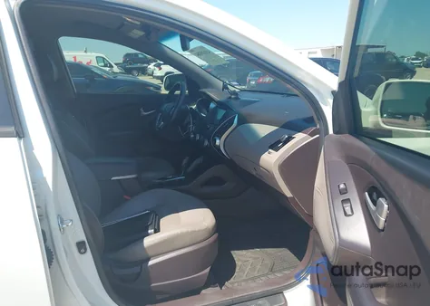 2012 Hyundai Tucson Limited z USA, uszkodzony, nr VIN KM8JU3AC5CU482718